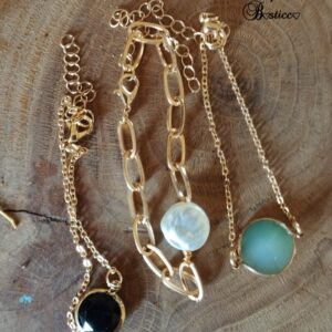 Tris di braccialetti con pietra centrale