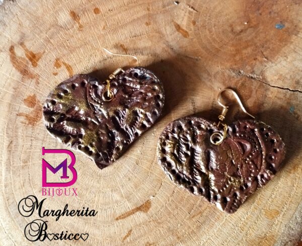 Orecchini cuore effetto cuoio