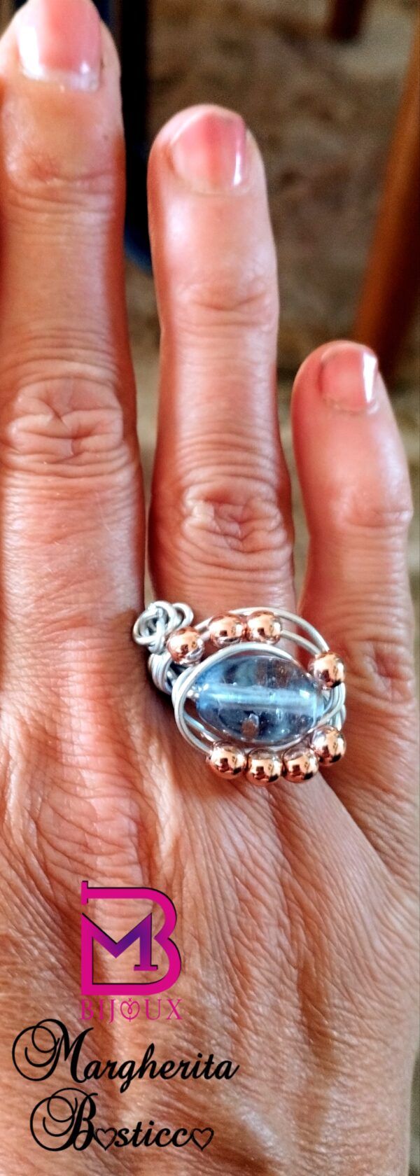 Anello con murrina azzurra e ematite argento