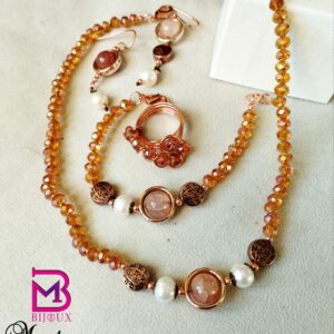 Parure di cristallo arancio, perle di fiume e rame