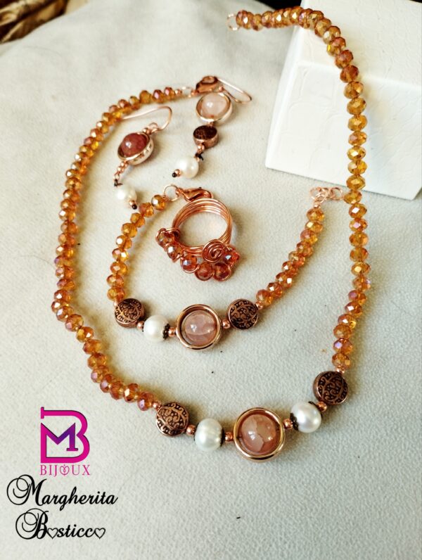 Parure di cristallo arancio, perle di fiume e rame